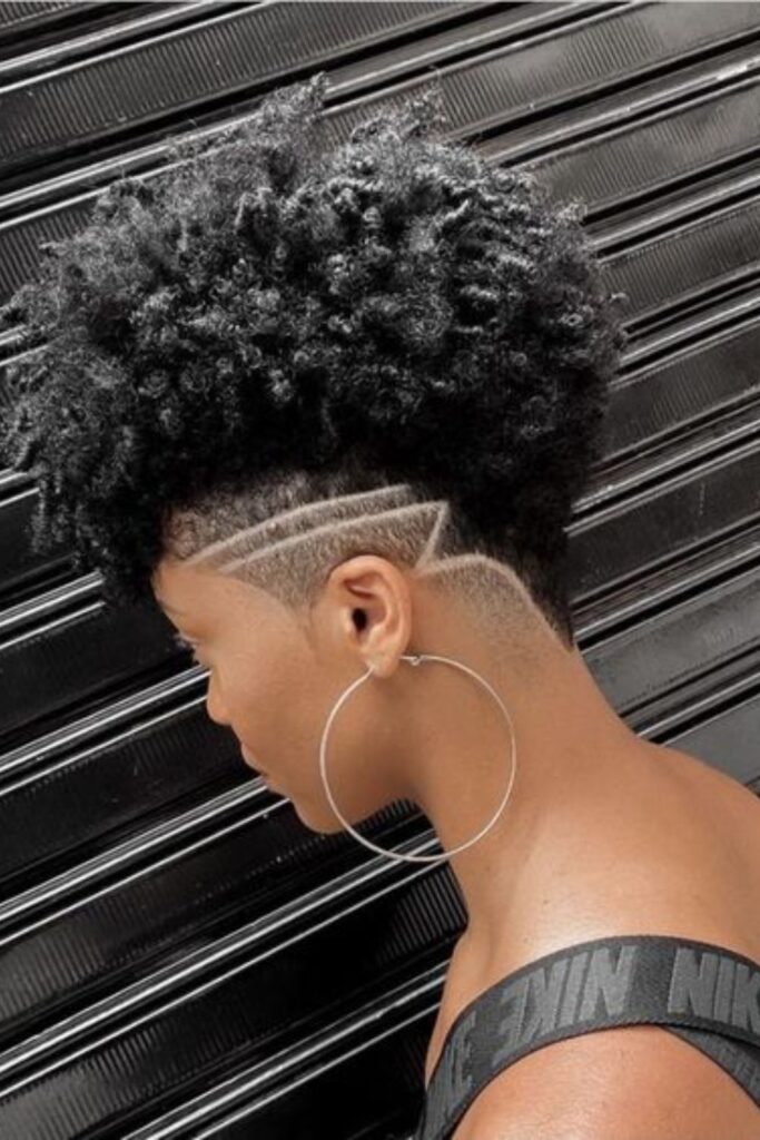 Curly Half Shaved Natural Hairstyle
