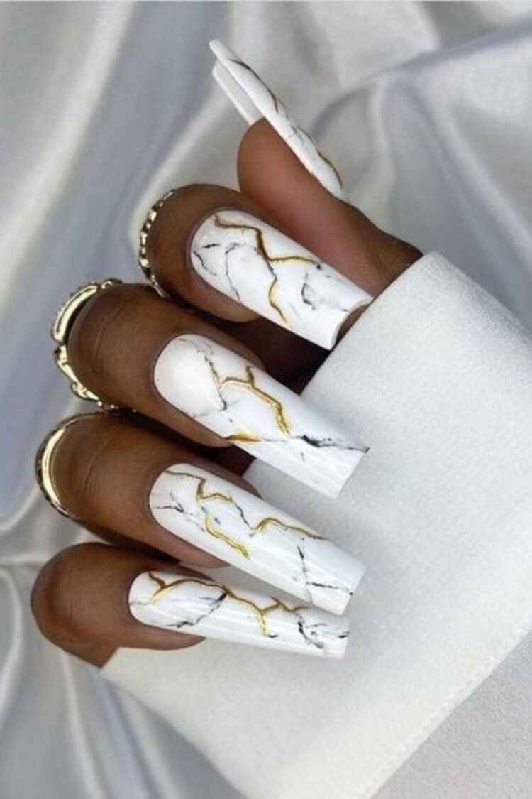20 Marble Nail Designs You Ll Love To Try In 2024 White Marble Design With Gold Nails 750x1125