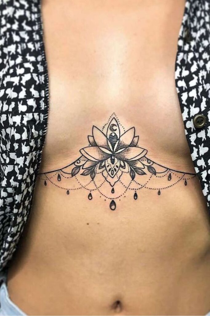 Sternum Lotus Flower Tattoo