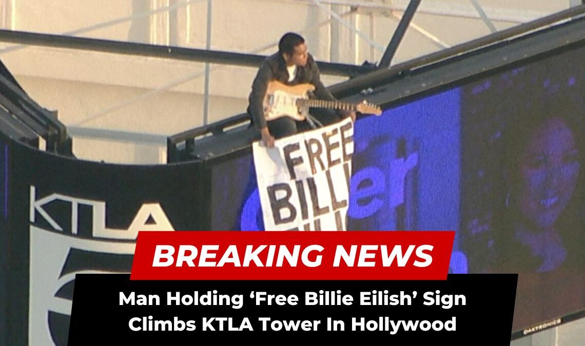 Man Holding ‘Free Billie Eilish’ Sign Climbs KTLA Tower In Hollywood