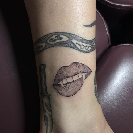 Vampire Teeth with a Dagger