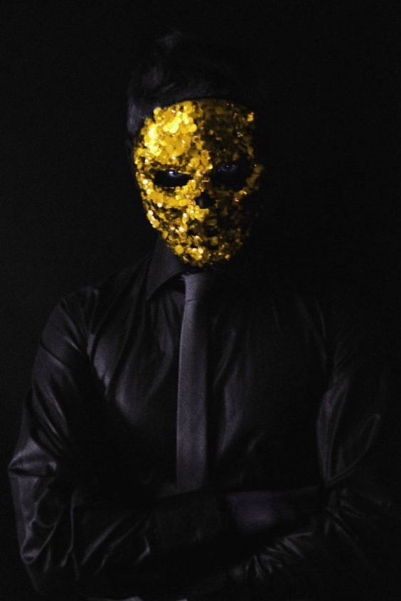 Gold-Faced Mask with Suit and Tie