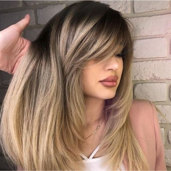 Side Bangs with Long Layers and Highlights