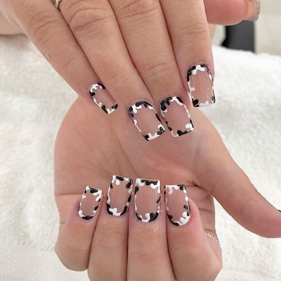 Bordered Cow Print Nails