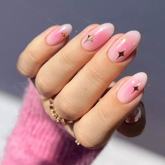 Soft Pink Glow Nails With Sparkles