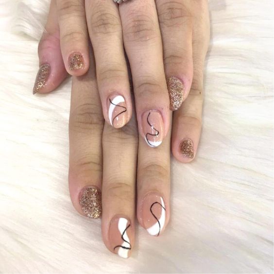 Abstract Pink and Gold Nails