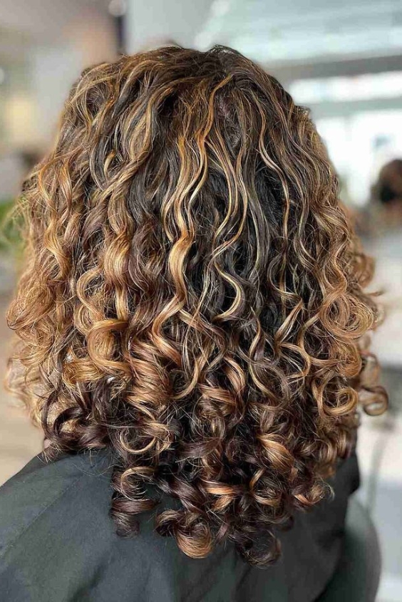 Honey-Toned Balayage on Curly Hair