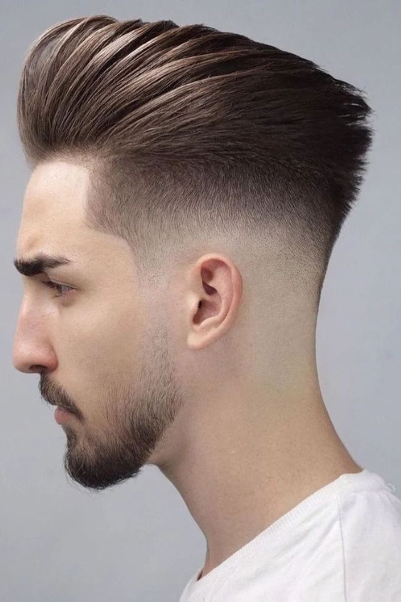 Low Fade Slick-Back and Heavy Stubble