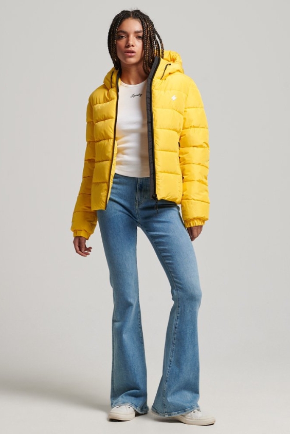 Yellow Puffer Jacket with Classic Blue Jeans