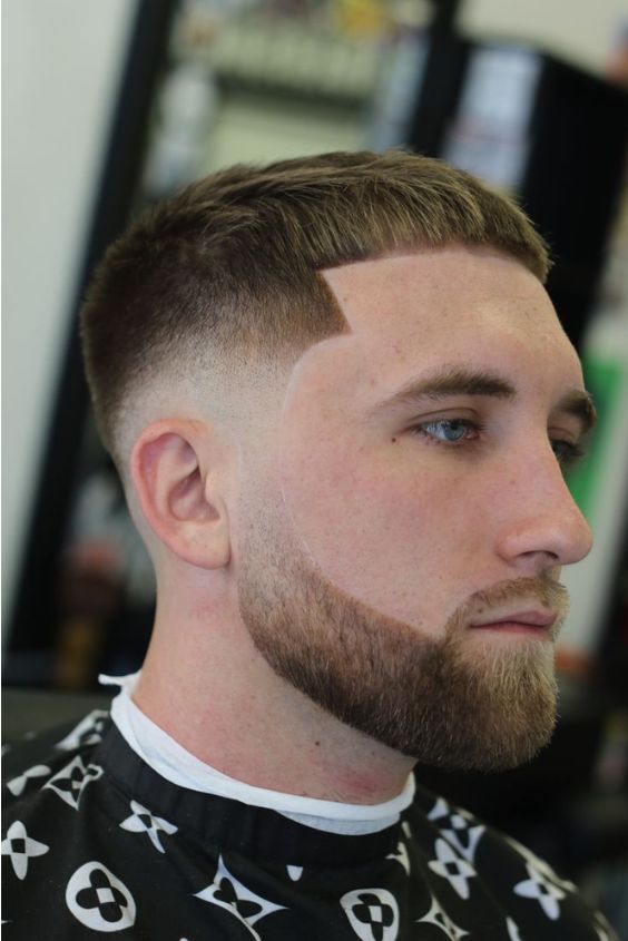 Clean-Shaven Contrast with Low Fade Beard