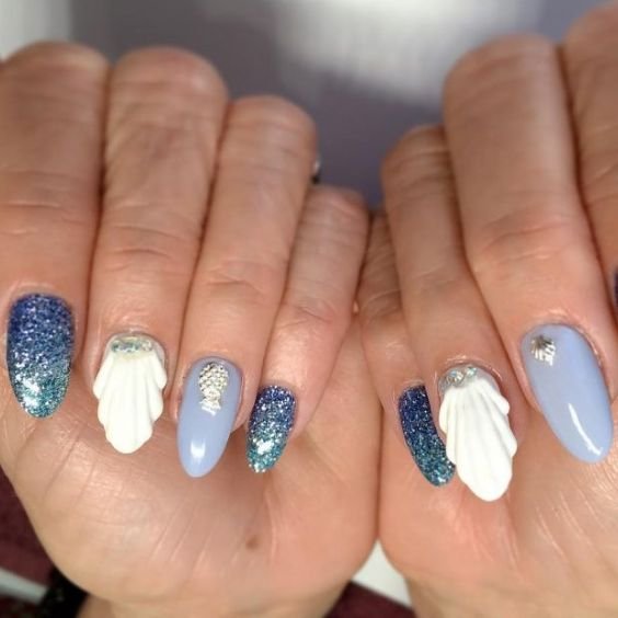 Ocean Blue Squoval Nails with Seashell Art