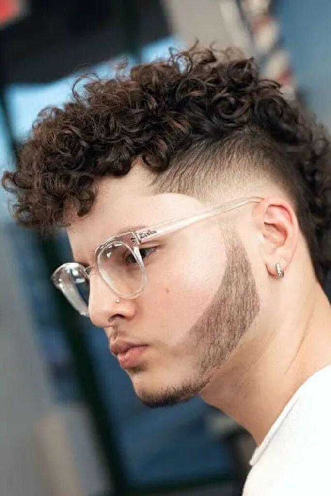 Modern Curly Mohawk With Taper Fade