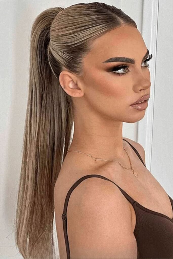 Sleek High Ponytail with Middle Part