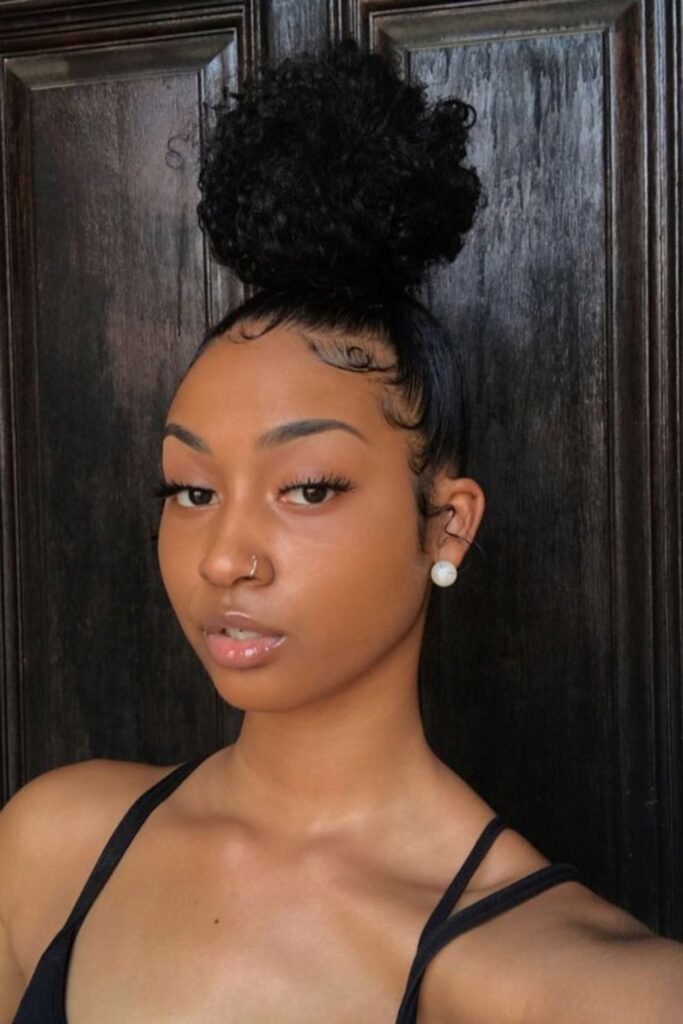 Tidy Afro Puff with Slicked Baby Hairs