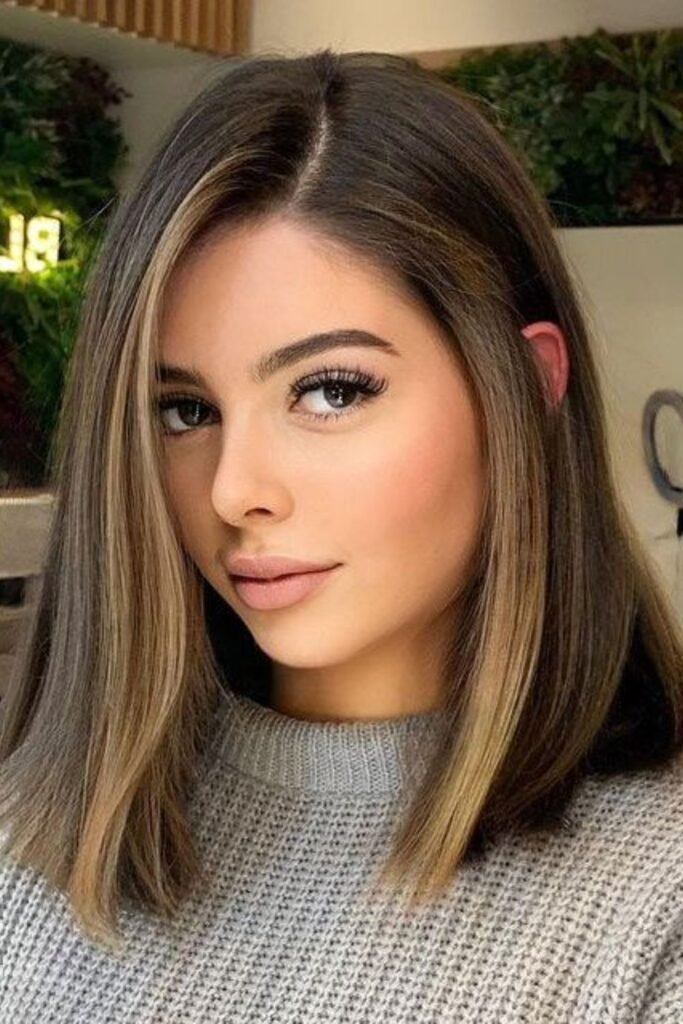 Face-Framing Streaks with Sleek Straight Hair