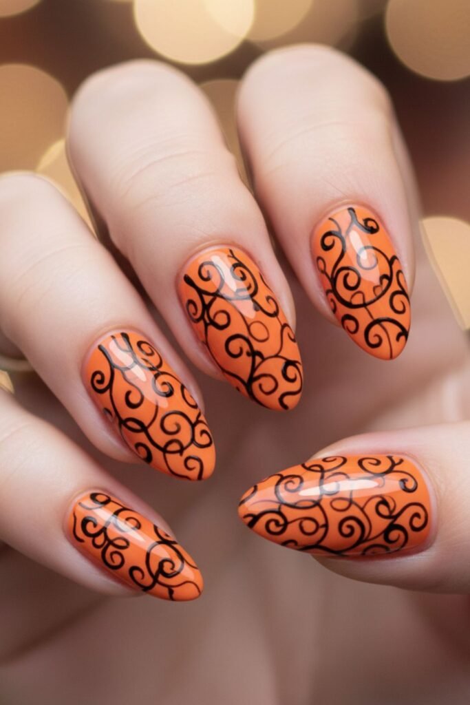 Orange And Black Pumpkin Swirl Nails