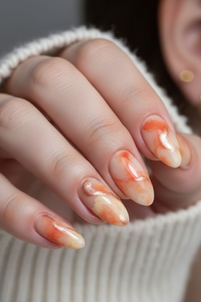 Watercolor Effect Orange And Beige Nails