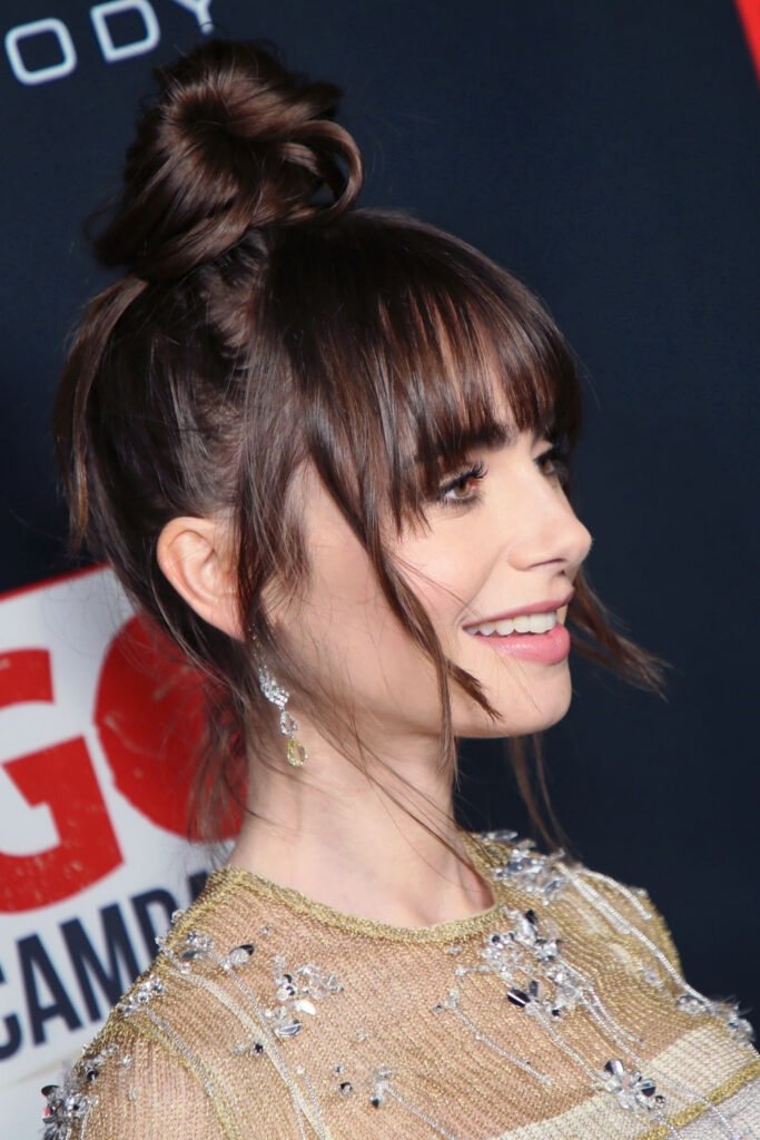 Romantic Messy Updo With Loose Tendrils