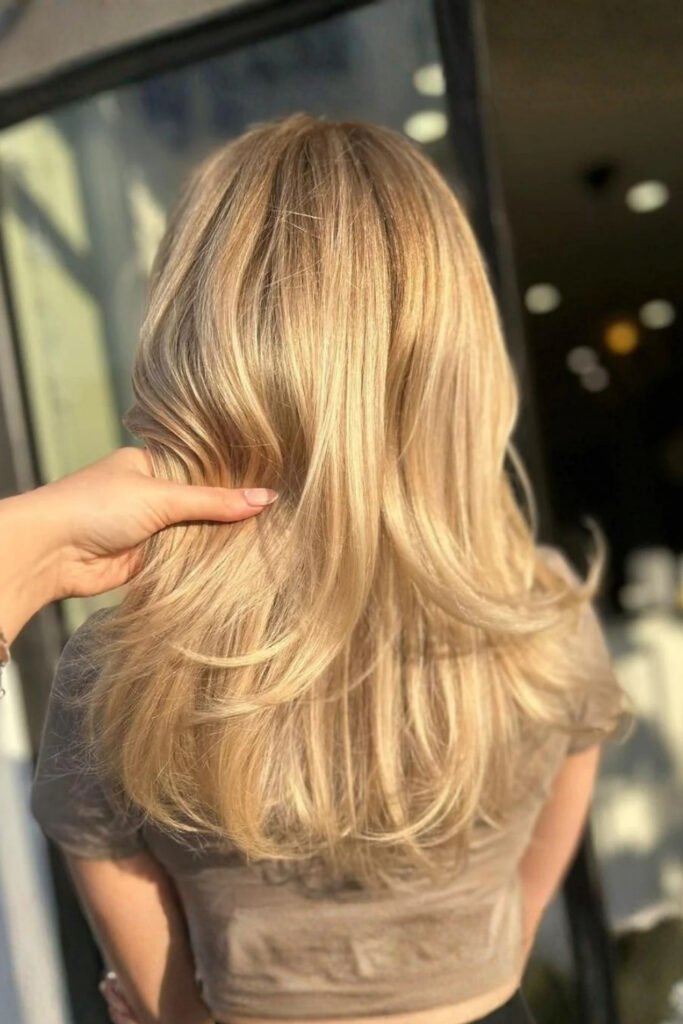 bright creamy blonde hair with highlights