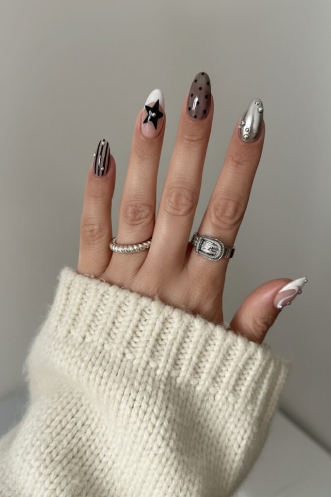 Almond nails mixing silver chrome, glitter and nude