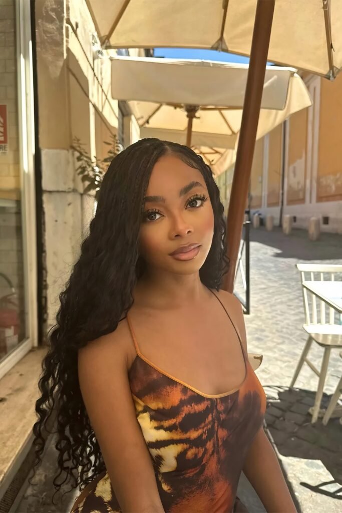 Long boho knotless braids with curly strands