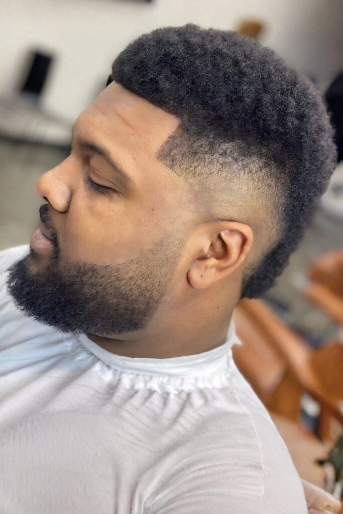 Crisp Short Cut for a Round Face on a man with a round face