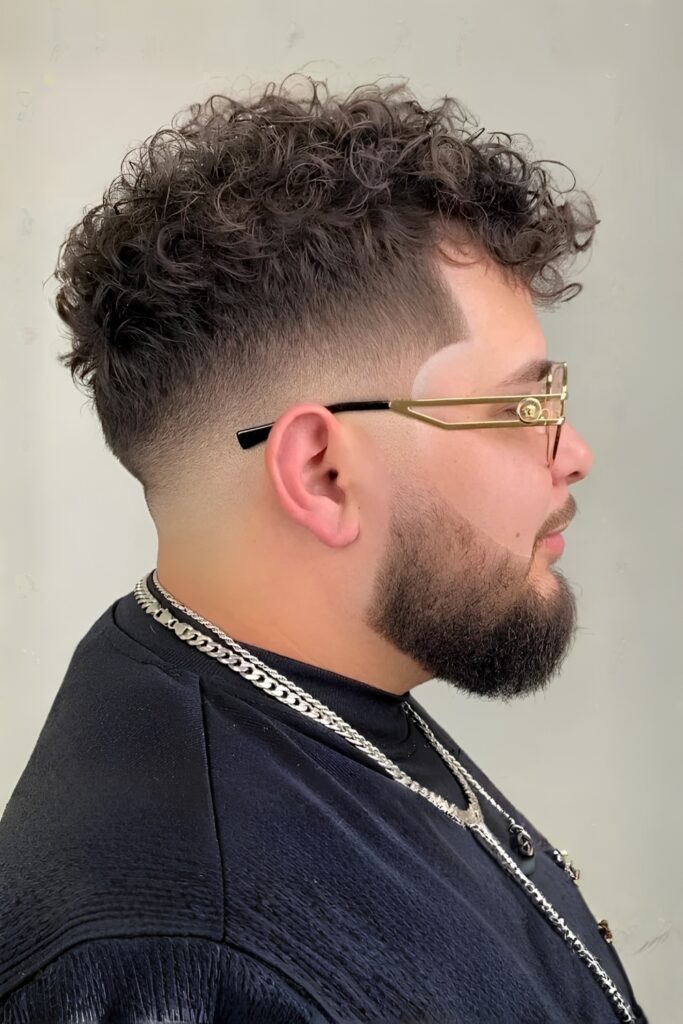 Curly Hair Undercut Look on a man with a round face