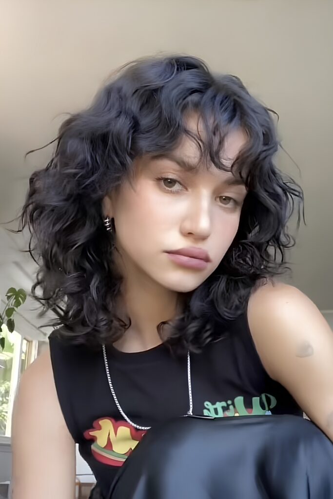 Curly Wolf Cut At Shoulder Length
