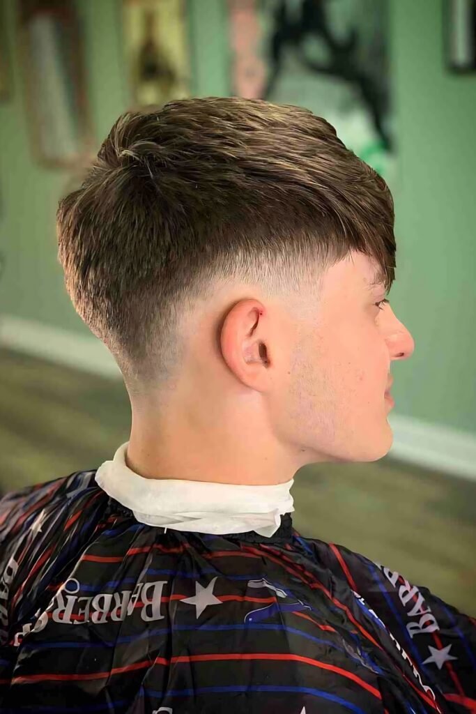 Low Drop Fade Haircut With Bangs