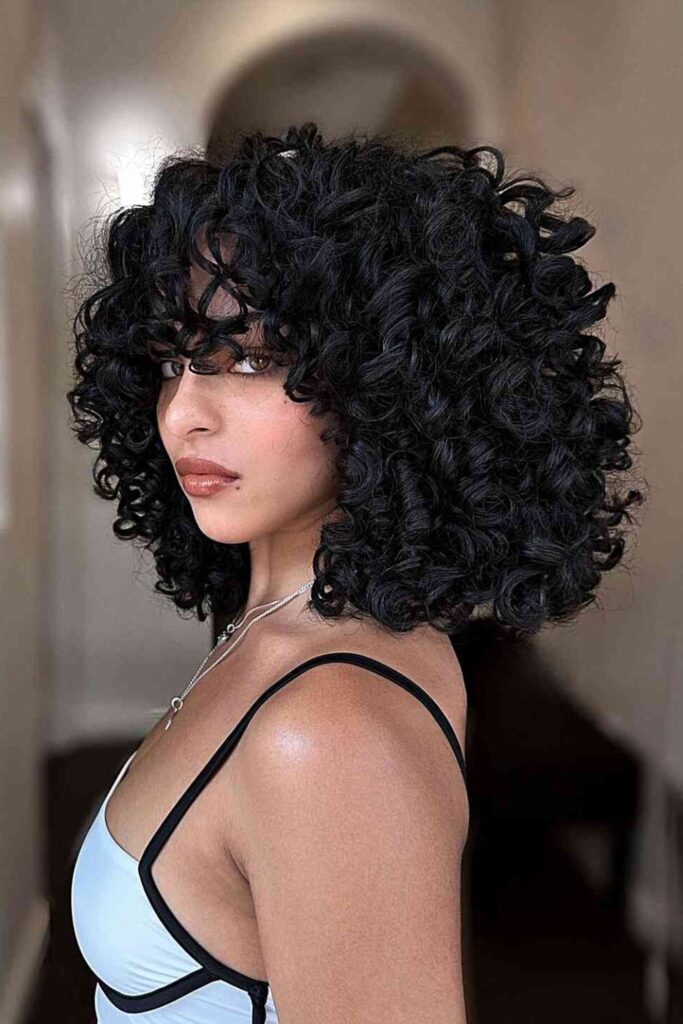Rounded Shoulder-Length Cut with Soft Volume