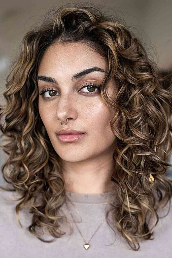 Shoulder Length Curly Layers with Face-Framing Curls