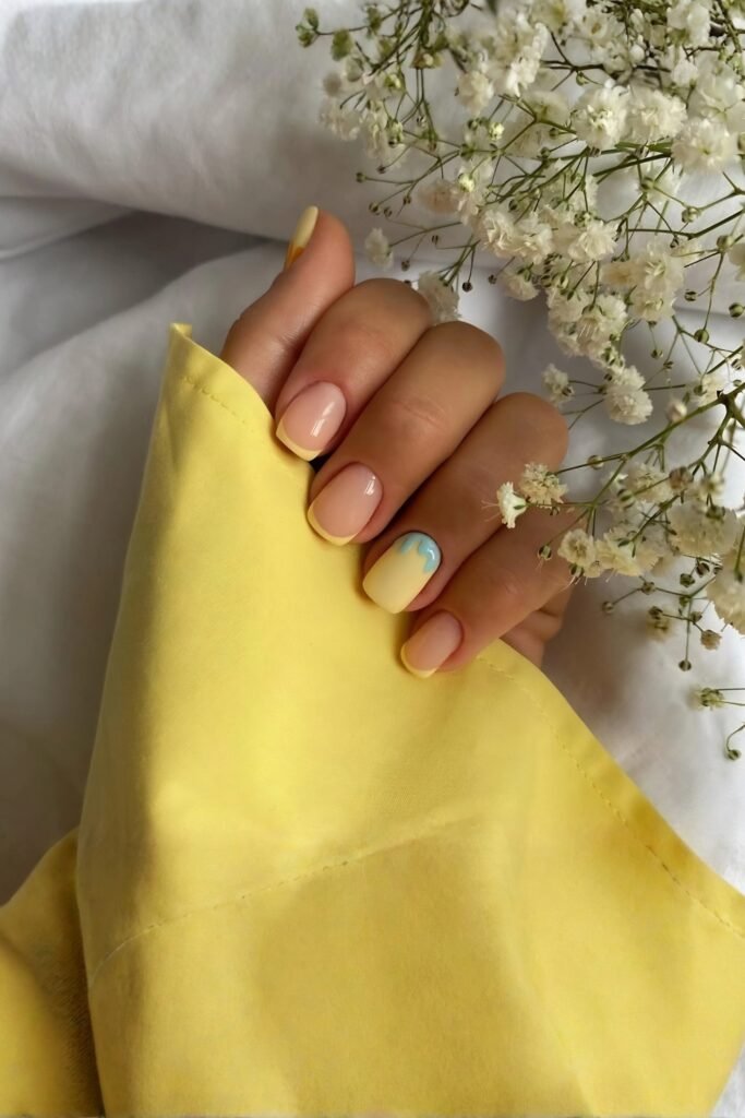 Soft Yellow French Tip April Nails