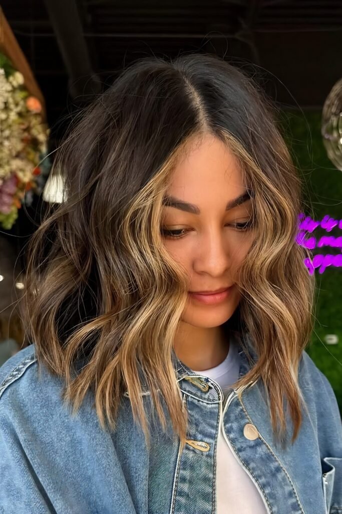 Wavy highlighted bob with choppy ends