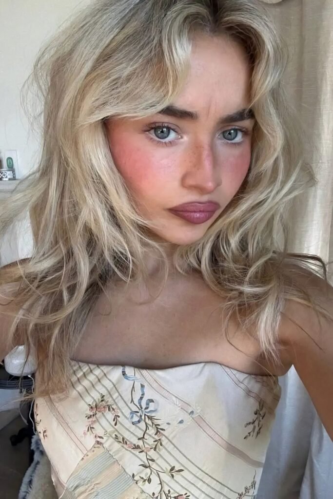 Tousled blonde beach waves