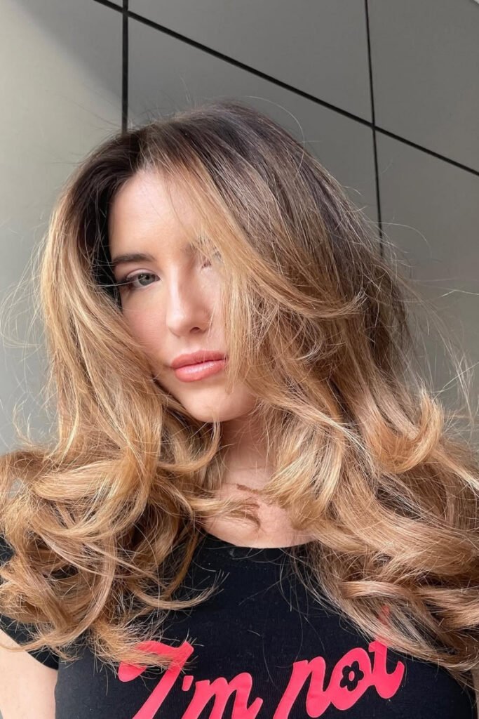 Woman with a bouncy, voluminous blowout