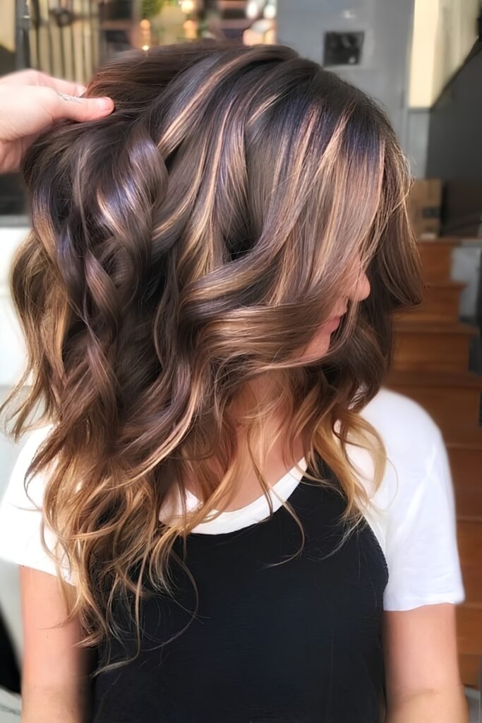 Dark brown curls with bold caramel ribbons