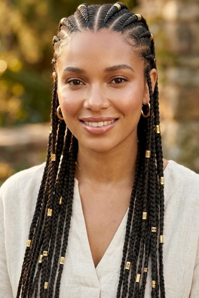 Center-Part Bo Derek Braids with Gold Cuffs