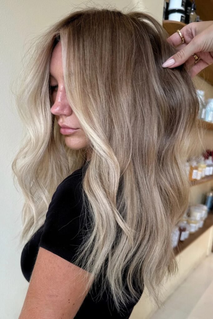 Frosted blonde hair with darker panels underneath