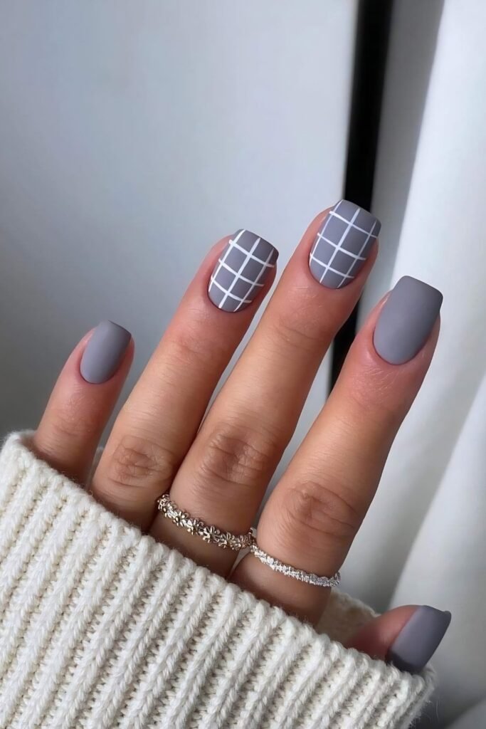 Matte grey plaid nails with solid grey accents