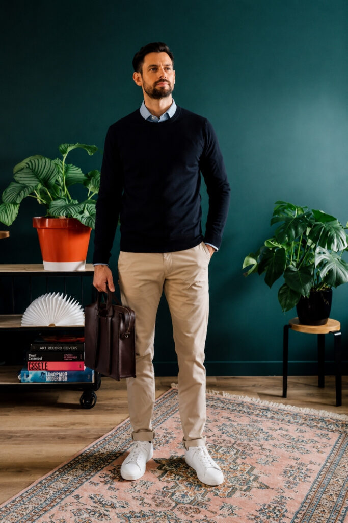 Navy crew-neck sweater with khaki chinos