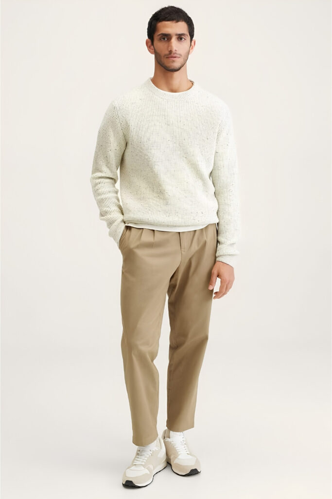 White crew-neck and khaki chinos