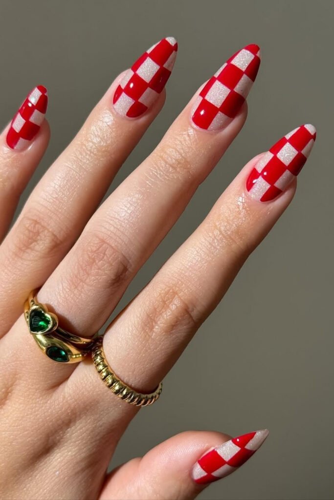 Almond nails with red and white checkerboard tips