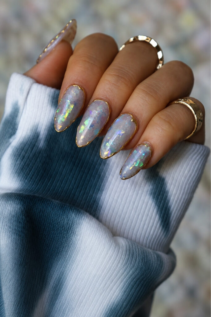 Opal-inspired gold chrome nails