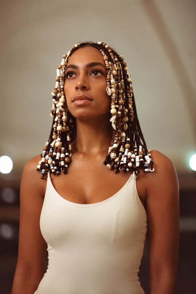 Braids with cowrie shells
