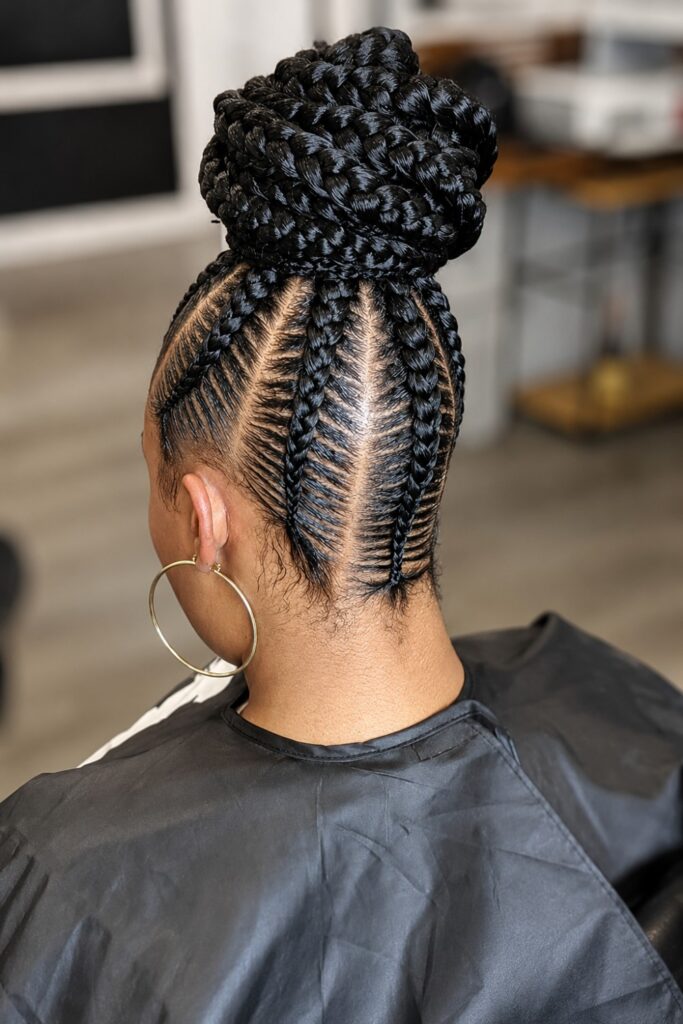 Cornrow updo with an exposed nape