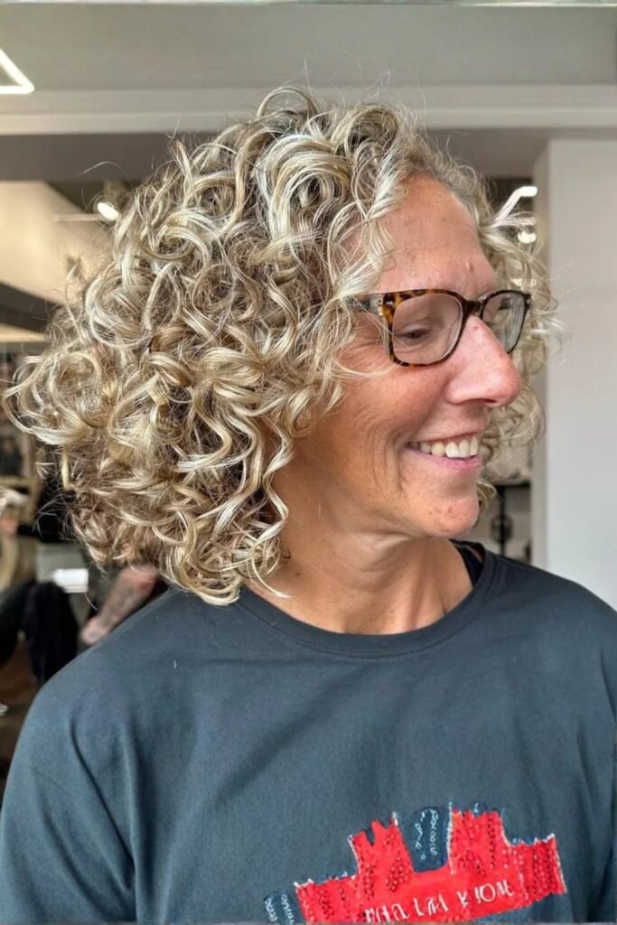 Curly Bob with Blonde Highlights