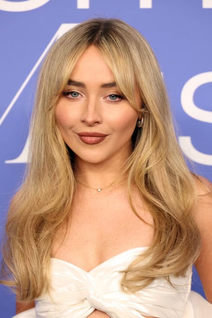 Sabrina Carpenter-inspired hairstyle: Curtain Fringe with Voluminous Blowout