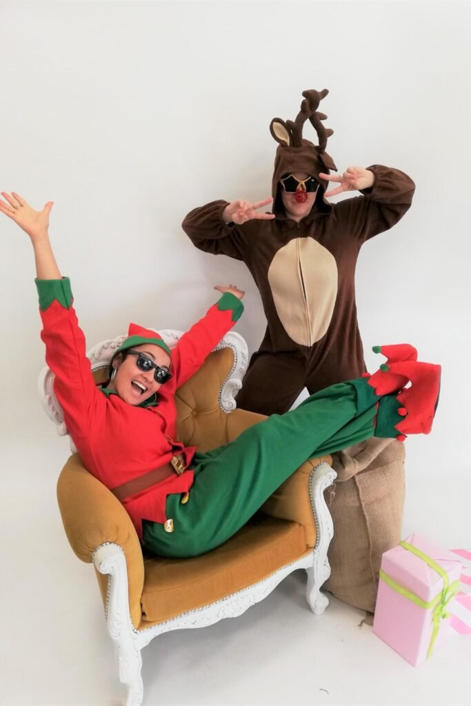 Couple in elf and reindeer costumes