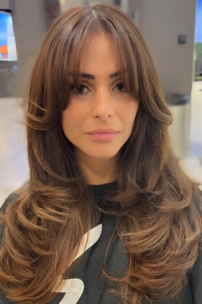 Long Butterfly Cut with Curtain Bang Side Part