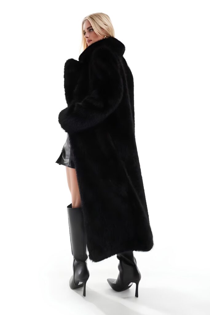 Long faux fur coat with knee-high boots